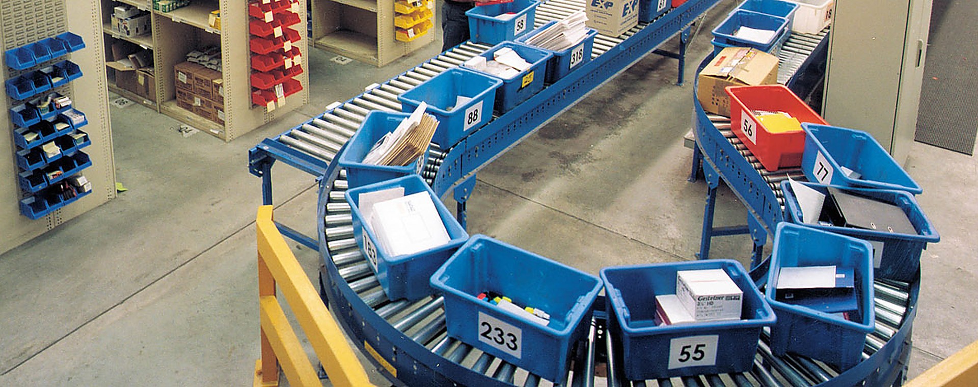 Rebell roller conveyor line handling crates inside a works